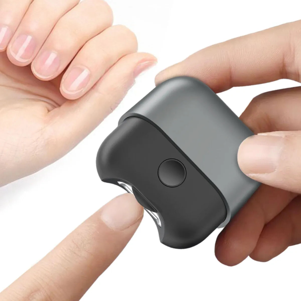 A person using an Electric Polishing Nail Clipper, holding the compact device while trimming their fingernail with precision.