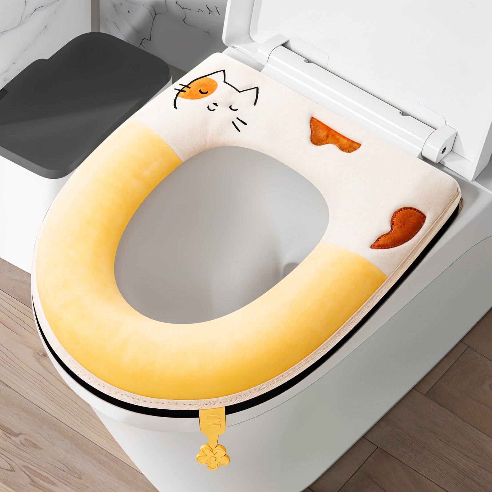 A Soft Plush Toilet Seat Cover Cushion  shown fitted on a toilet.