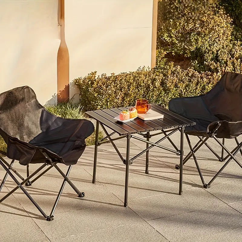 A Portable Folding Camping Chairs are Arranged near Garden Area.