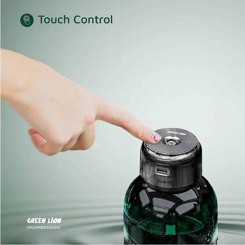 Hand pressing a button on a Green Lion Jumbo Fragrance Diffuser bottle, labeled 'Touch Control' with 'Green Lion' branding.