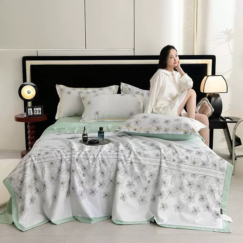 A Woman is Resting on Summer Cooling Comforter Set.