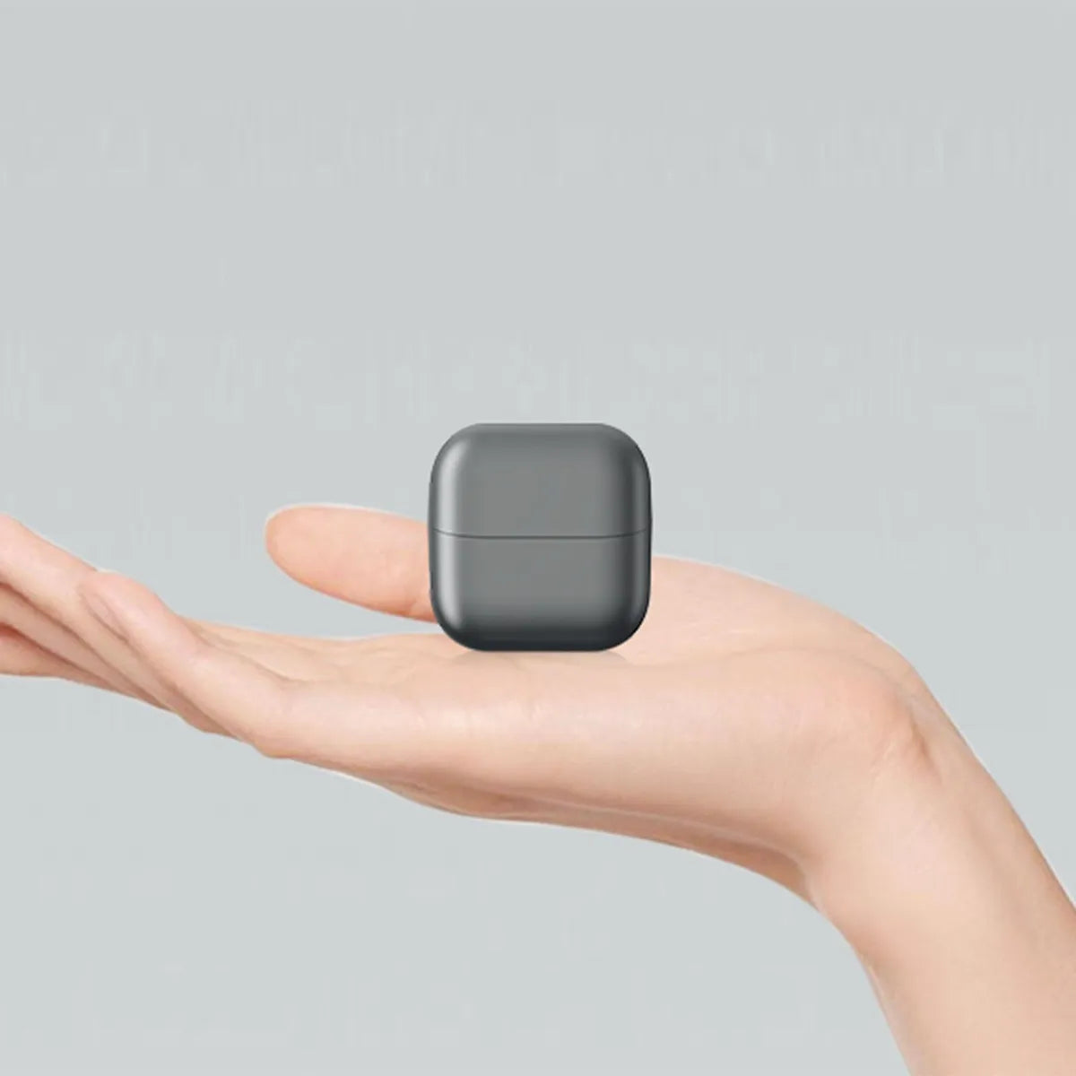 A person Holding an Electric Polishing Nail Clipper.