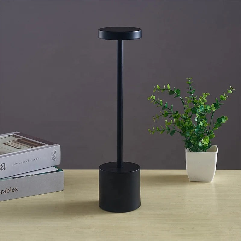 LED Desk Lamp on a table.