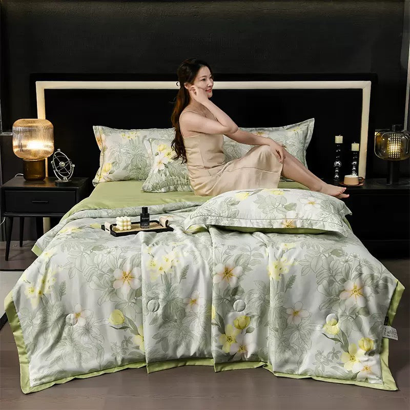 A Woman is Resting on Summer Cooling Comforter Set.