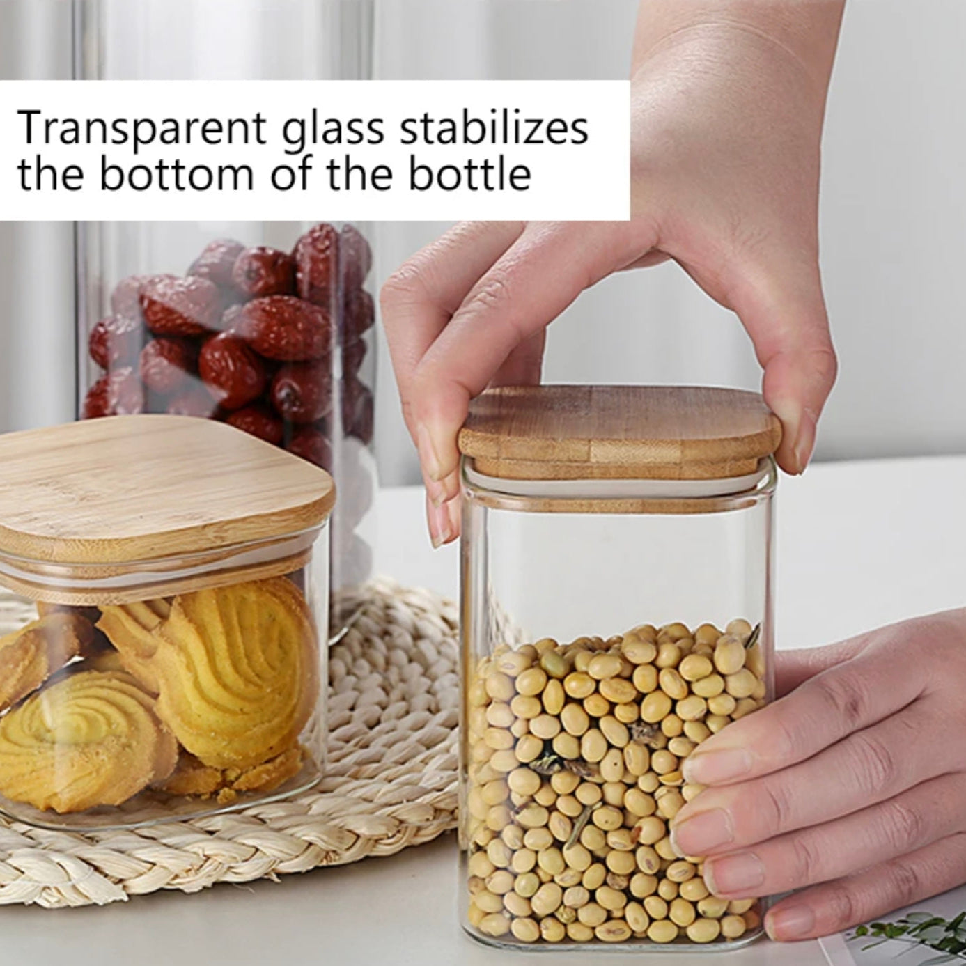 A Person is Opening the Lid Of Glass Storage Jars  are Filled with Snacks.
