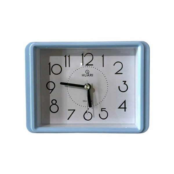 Rectangular blue alarm clock.