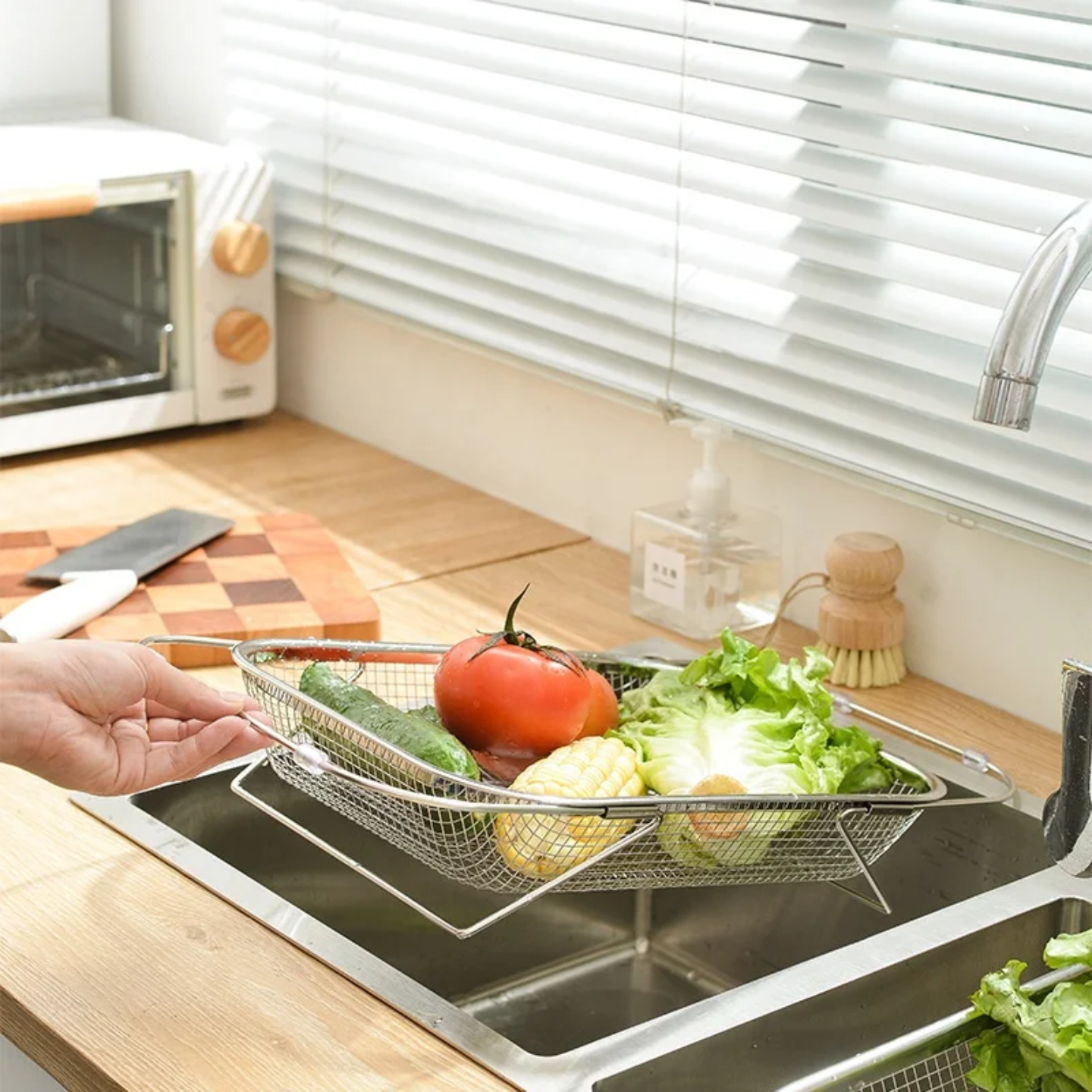 A Person is Washing Vegetables by Placing Sink Drain Basket Colander Over the Sink.