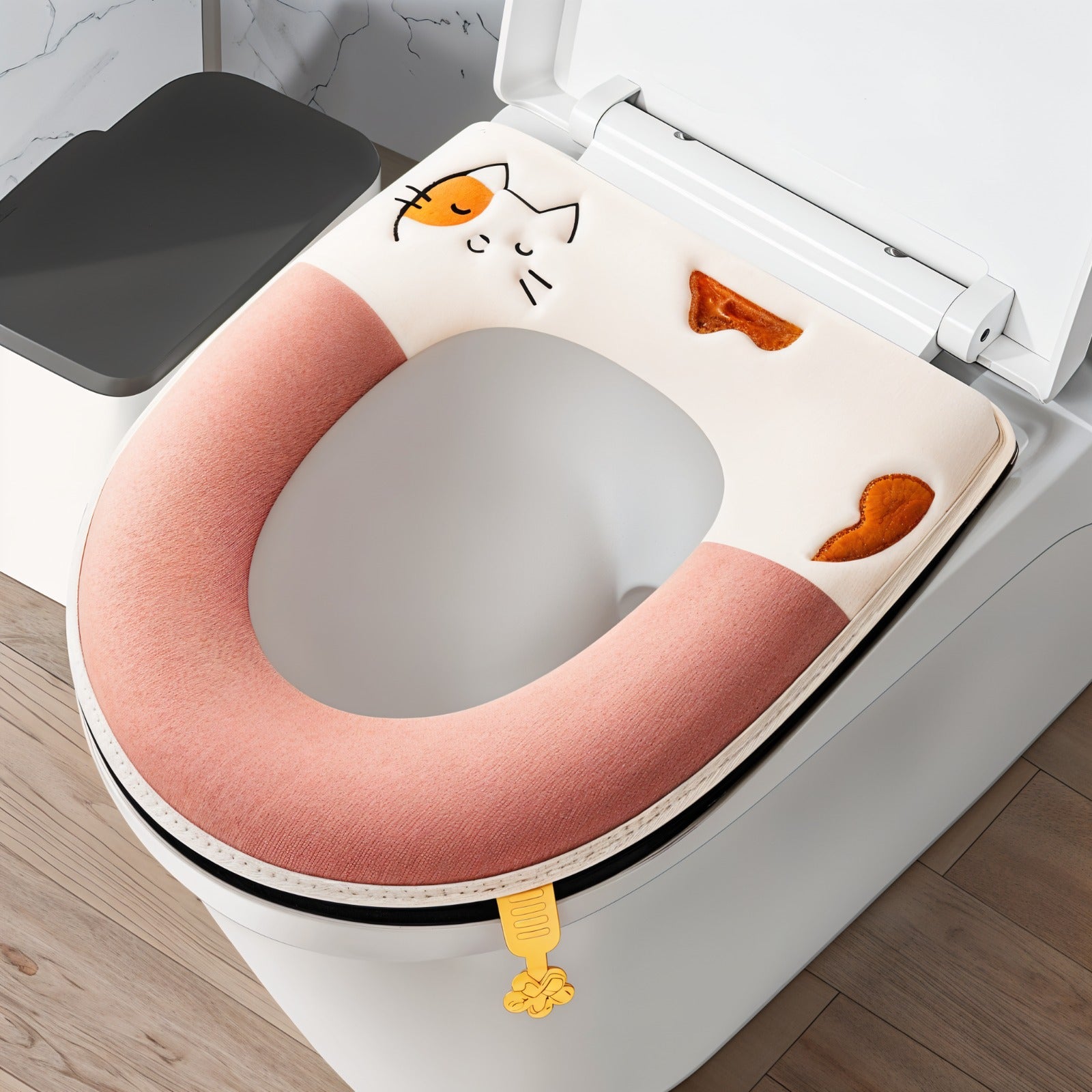 A Soft Plush Toilet Seat Cover Cushion  shown fitted on a toilet.