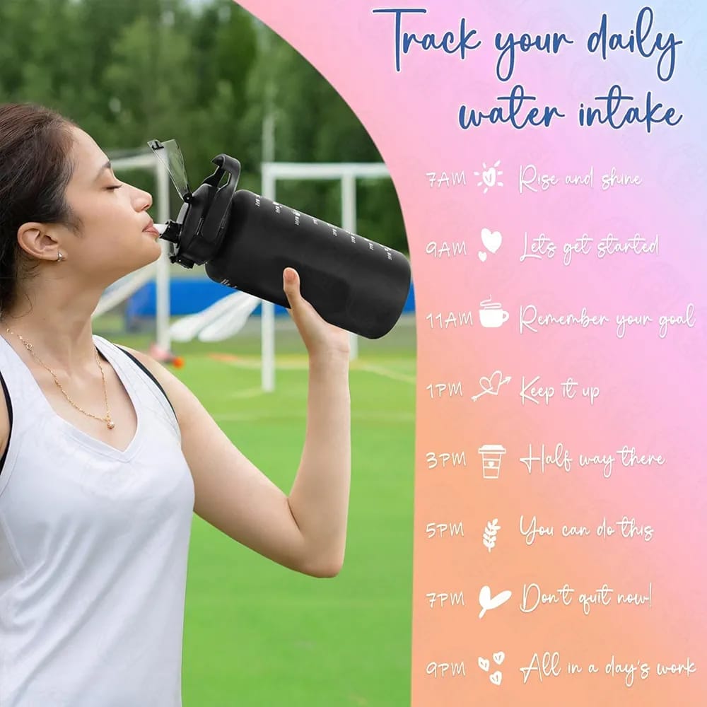 A lady is drinking water from a motivational sports water bottle with a built-in straw.