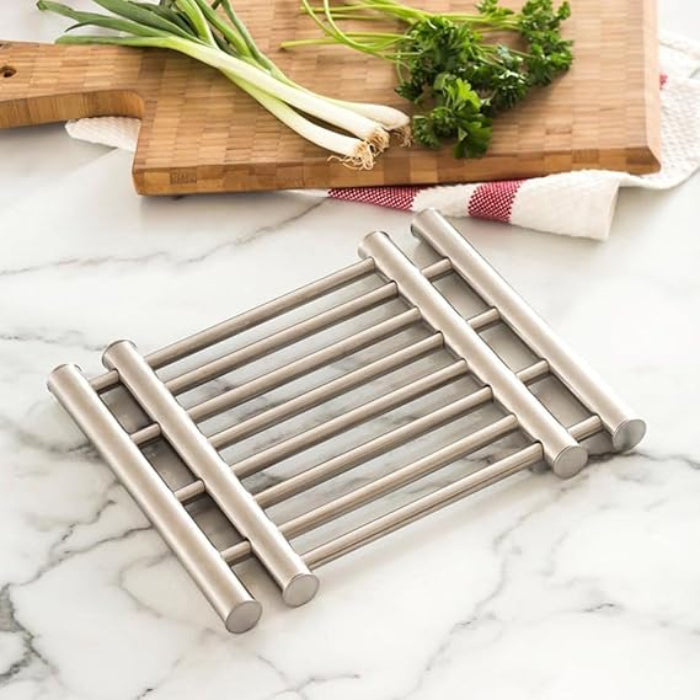 A Stainless Steel Trivet Pot Pad.