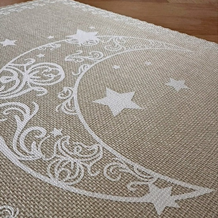 Table Mat Waterproof Dining Placemat with moon and star patterns on a textured surface