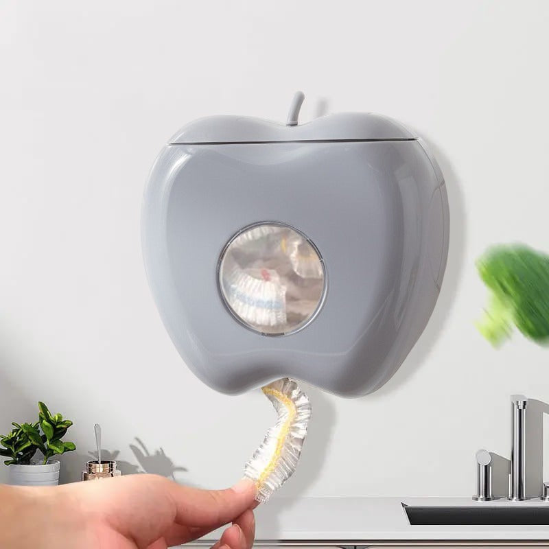 A Person is Taking Wrap From Wall Mounted Plastic Wrap Storage Box.