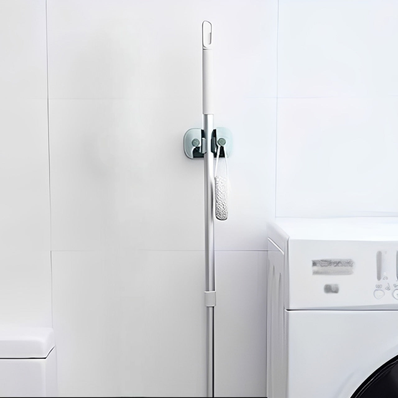 Mop is Kept on a Wall Mounted Single Mop Holder.