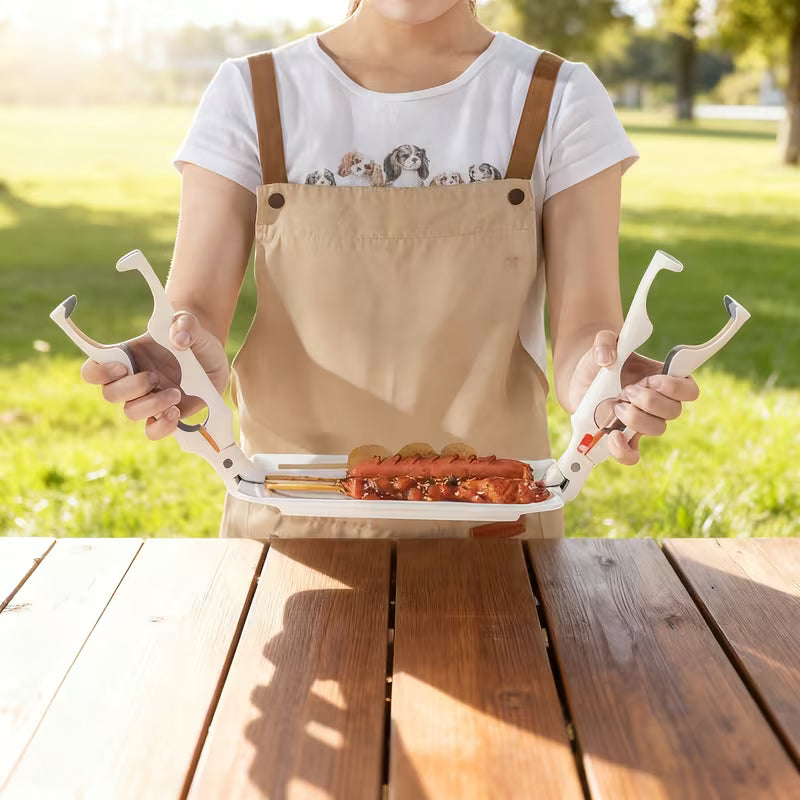 A Person is holding dish plate using 3-In-1 Heat-Resistant Kitchen Tongs.
