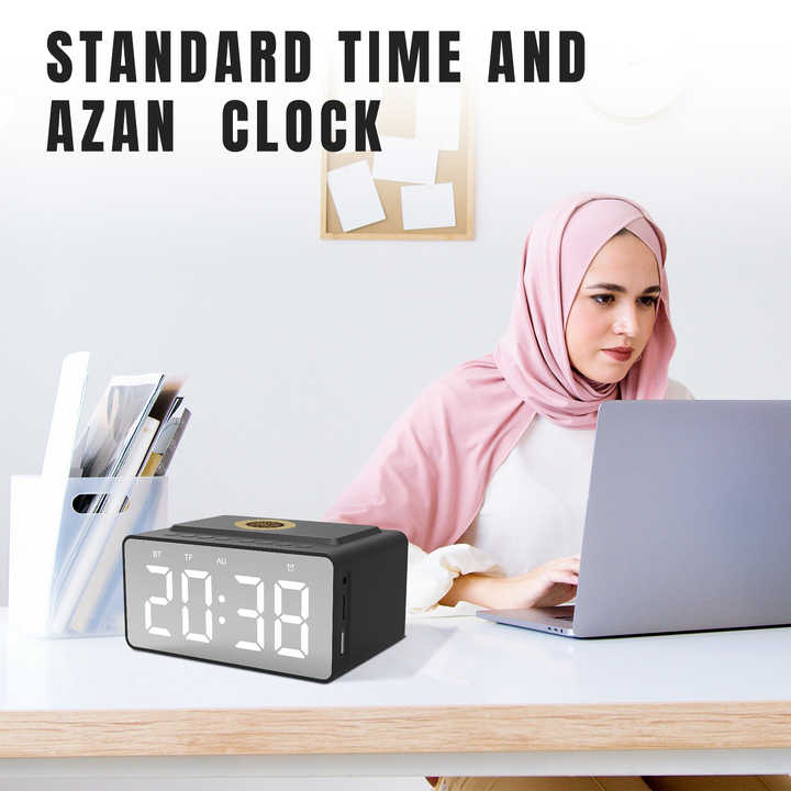 A Women is Working by Playing Quran Speaker with Azan Clock.