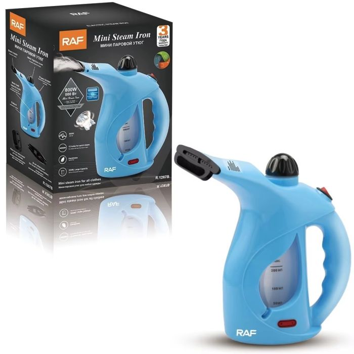 A RAF Mini Steam Iron with its Pack.