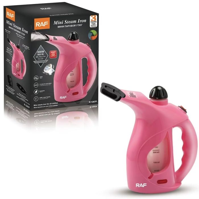 A RAF Mini Steam Iron with its Pack.