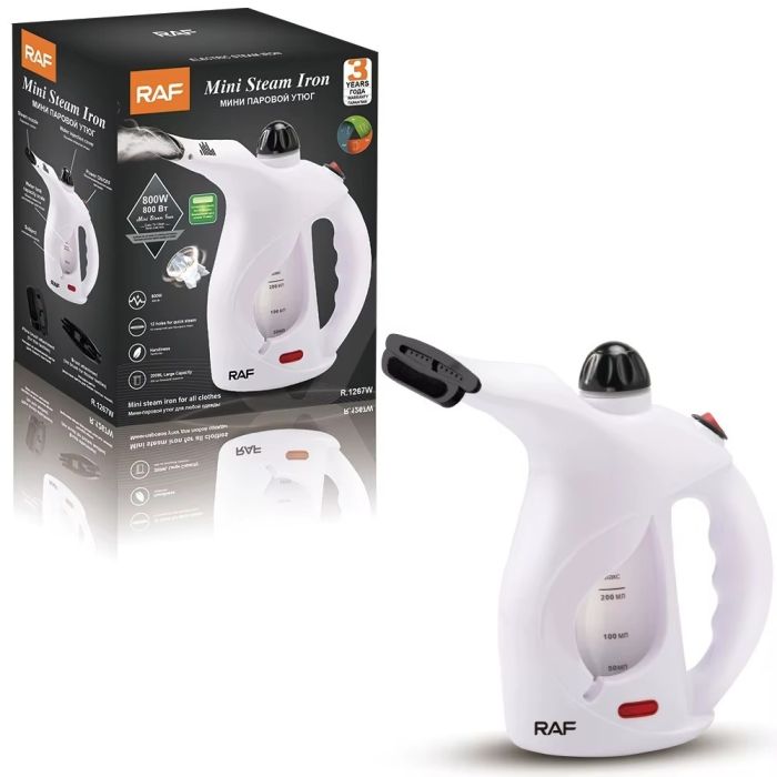 A RAF Mini Steam Iron with its Pack.