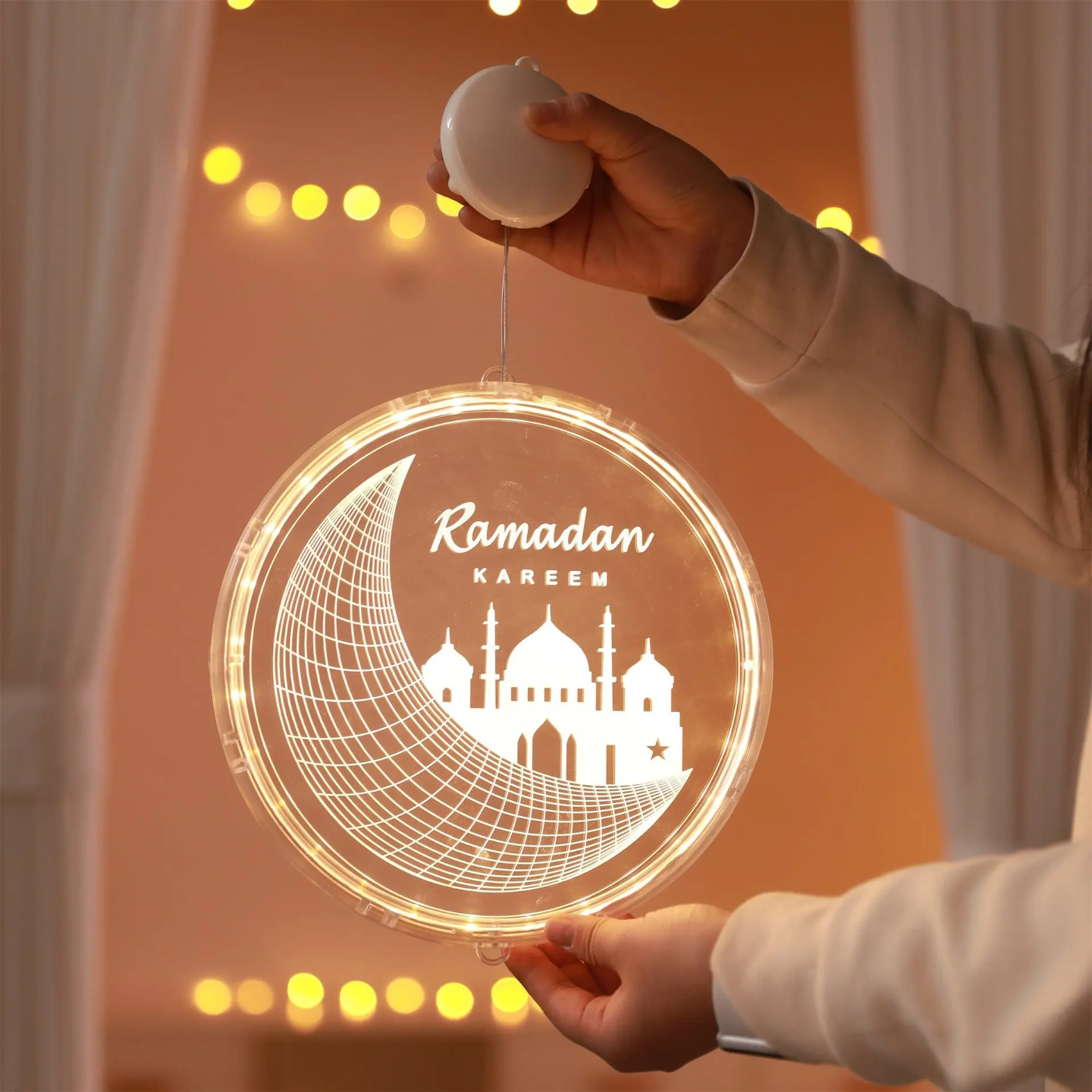 A Person is Holding Ramadan 3D Decorative Hanging Light.