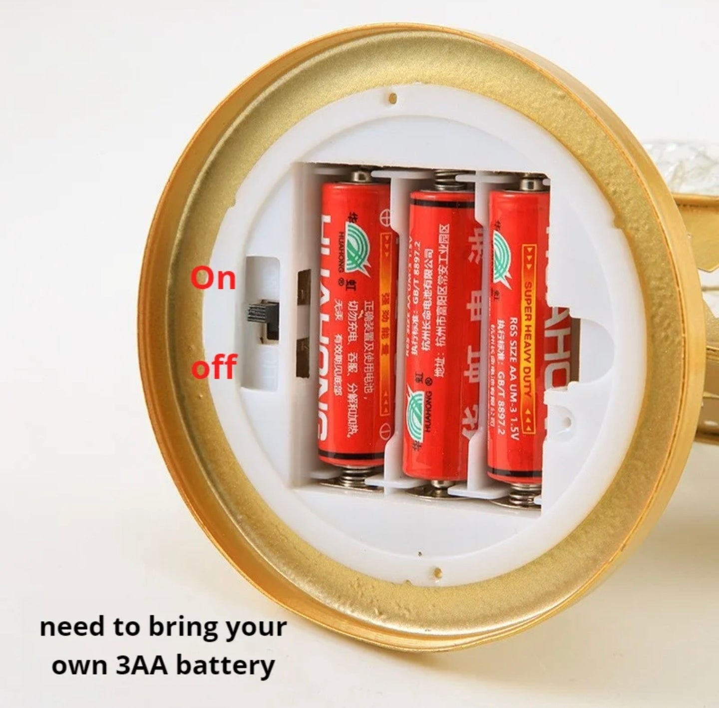 Batteries are inserted to Ramadan Moon LED Table Lamp.