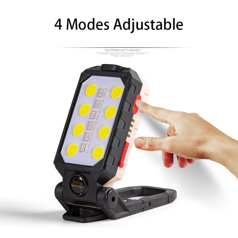 A Person is Operating Rechargeable Portable LED Flash Light.