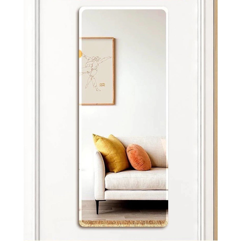 HD Self-Adhesive Acrylic Mirror Tiles reflecting a couch and pillows