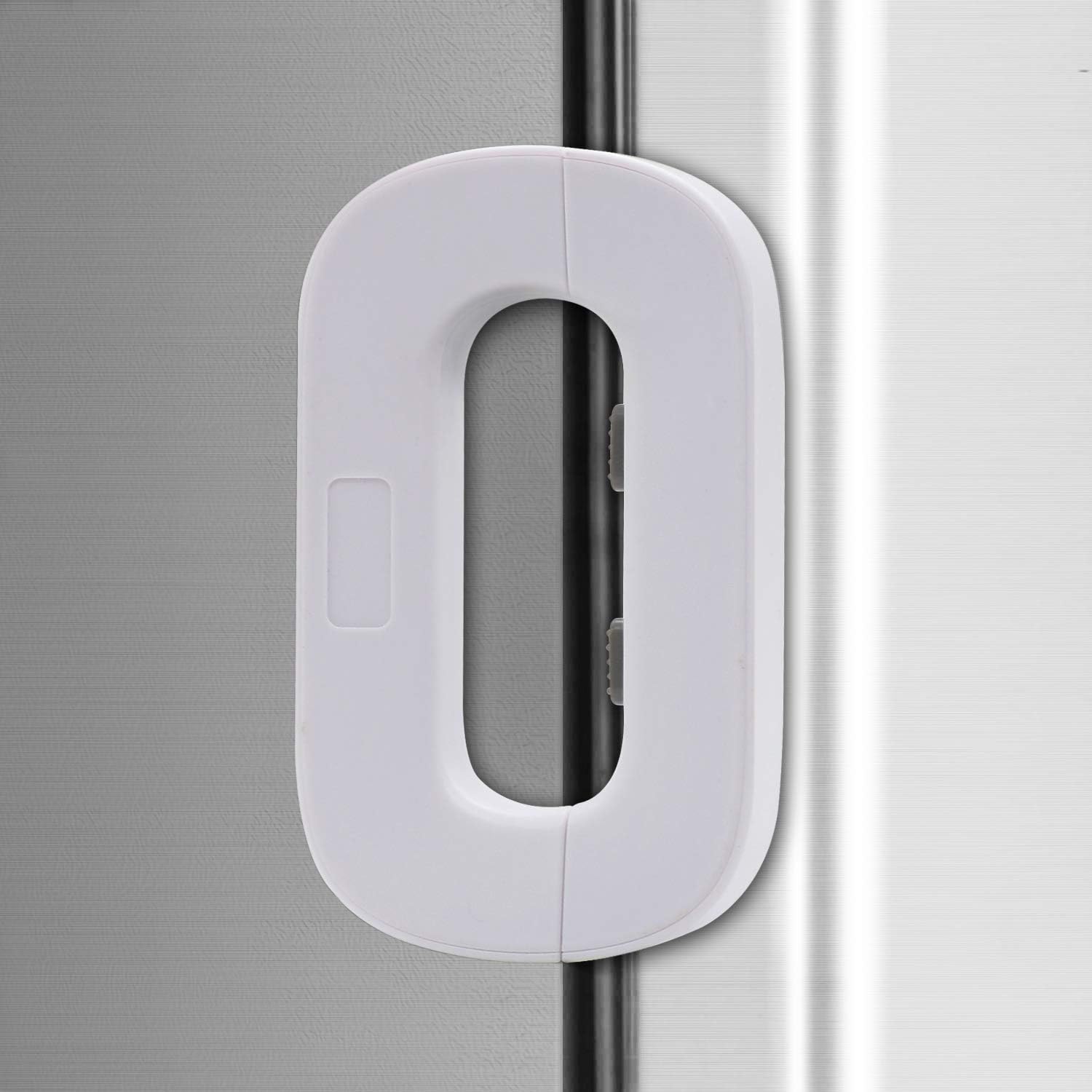 Close-up of a Refrigerator Child Safety Lock on a Refrigerator Door