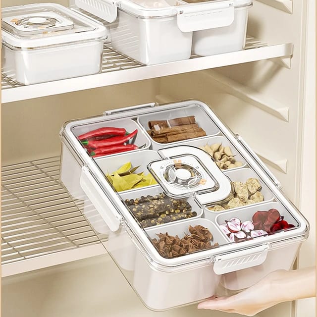 Spices Are Stored in a Refrigerator Storage Box and a Person is Placing it on a Referigerator.