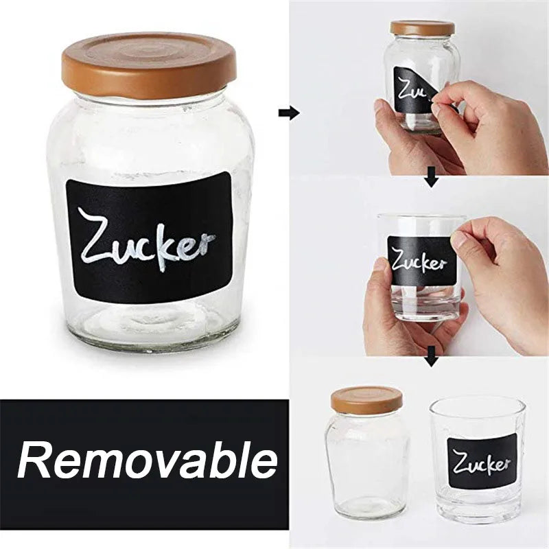 Someone is removing Reusable Black Chalkboard Labels Roll from the bottle