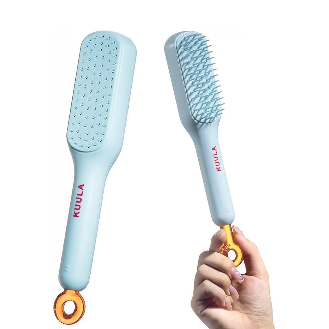 A Person is Holding Retractable Self Cleaning Hair Brush.