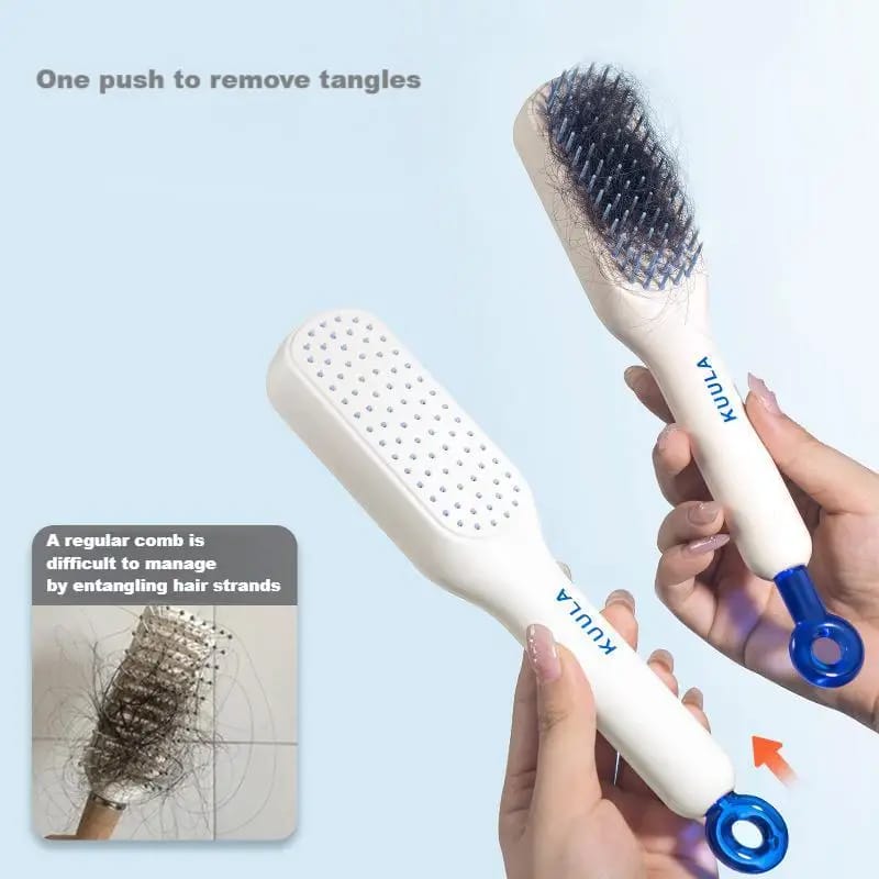 A Person is Holding Retractable Self Cleaning Hair Brush.