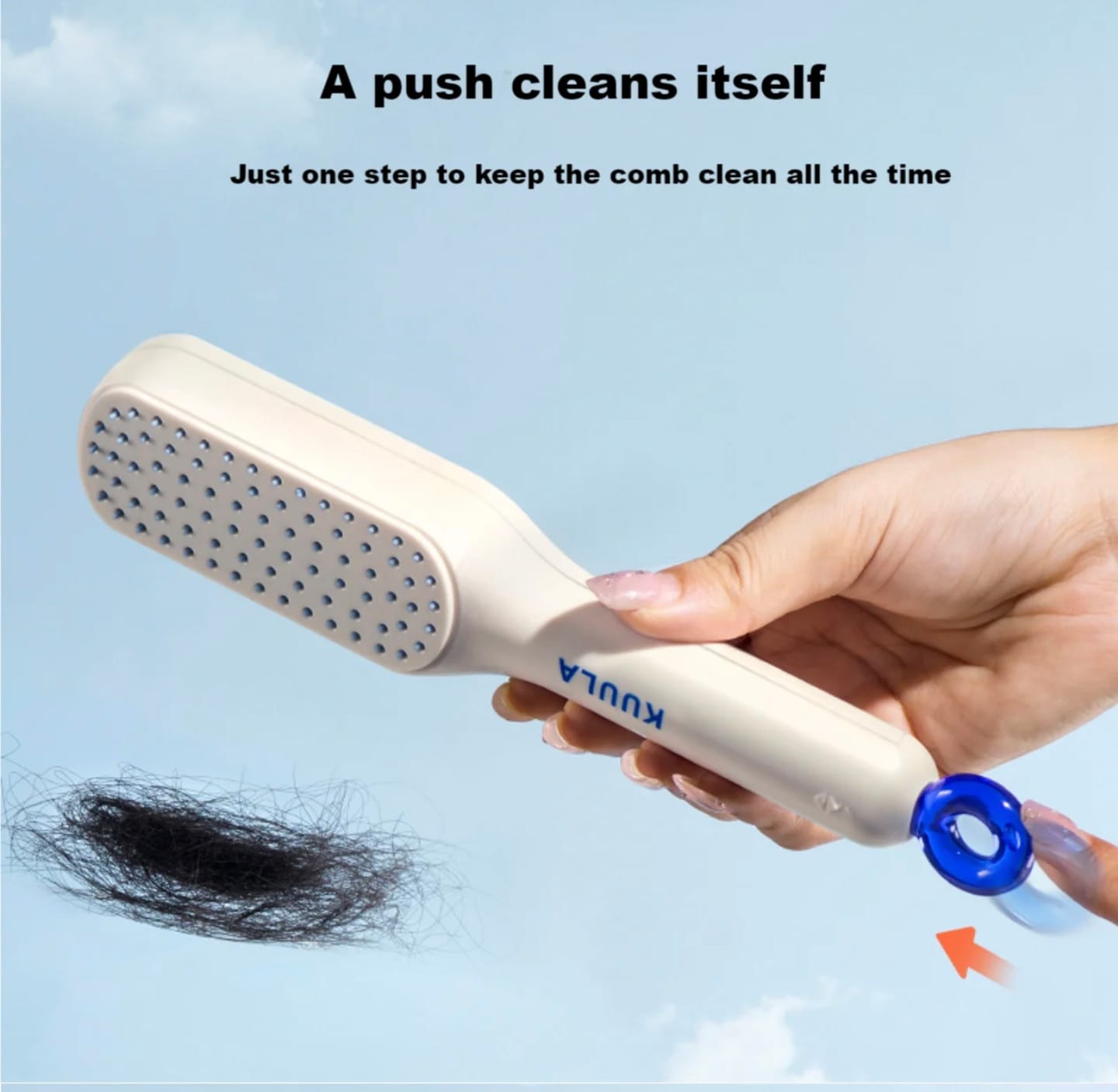 A Person is Holding Retractable Self Cleaning Hair Brush.