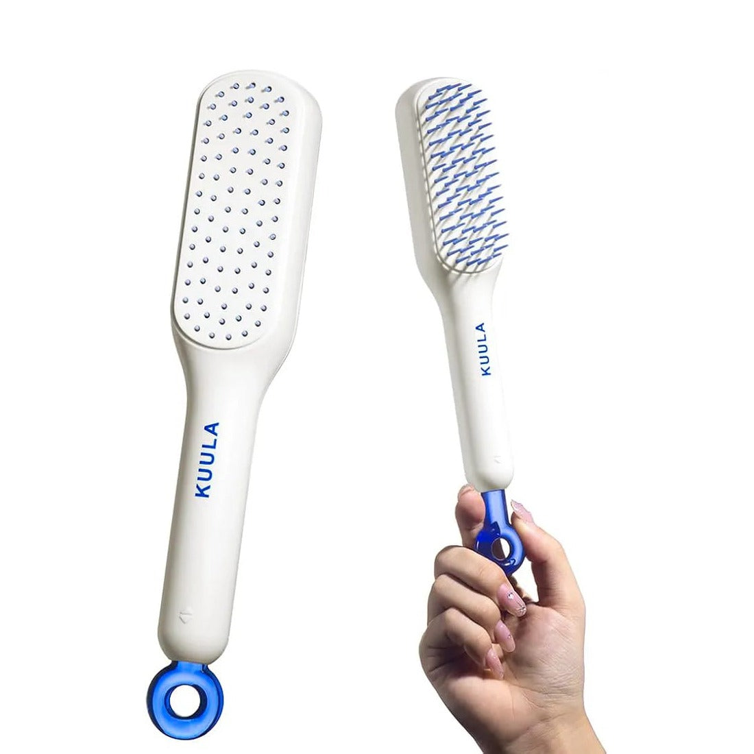 A Person is Holding Retractable Self Cleaning Hair Brush.