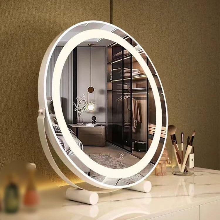 A Round LED Makeup Mirror is Placed on a Makeup Table.