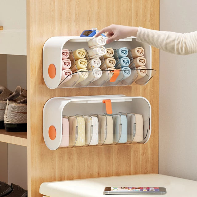 A person touching A Wall Mounted Underwear Storage Box