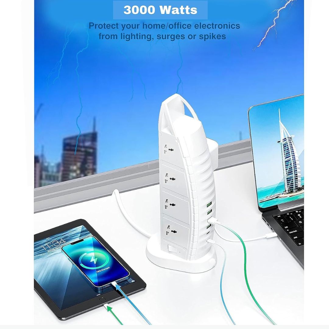 Sailboat Tower Power Strip with multiple outlets and USB ports on a desk with electronic devices, cityscape in the background.