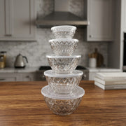 Stack of Salad Bowl Set with lids on a kitchen counter