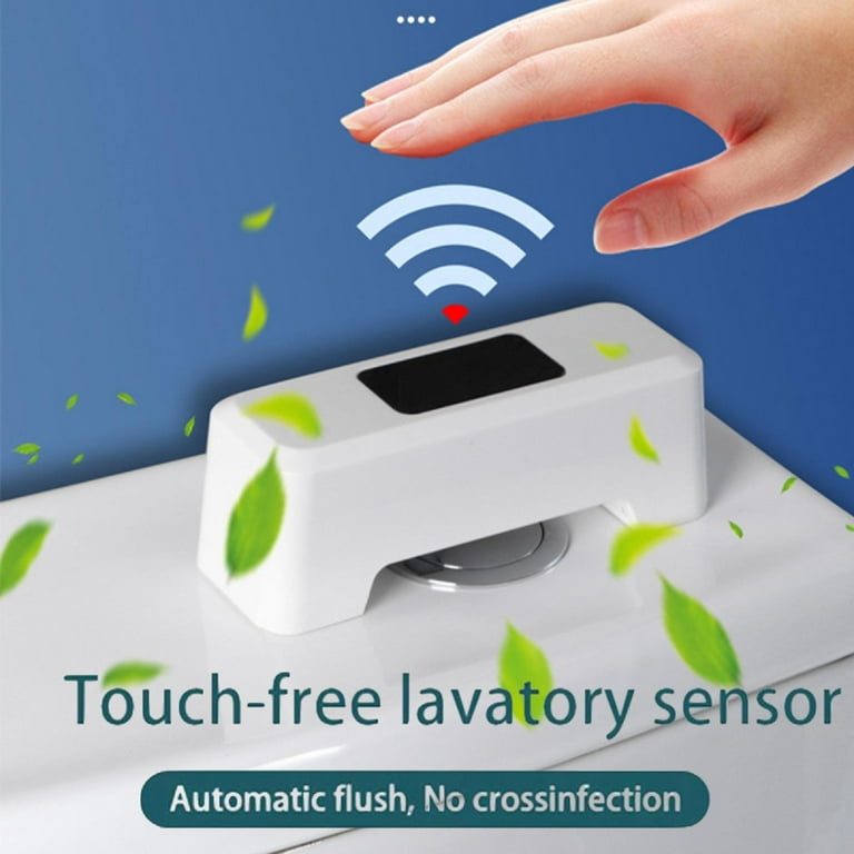 A Person is Showing Hand Towards Automatic Sensing Toilet Flush Button.