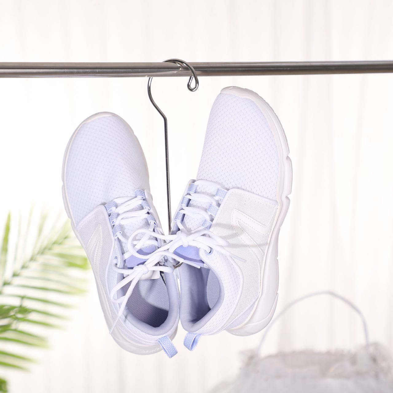 Shoes Are Hanged On the Shoe Drying Hanger Organizer.