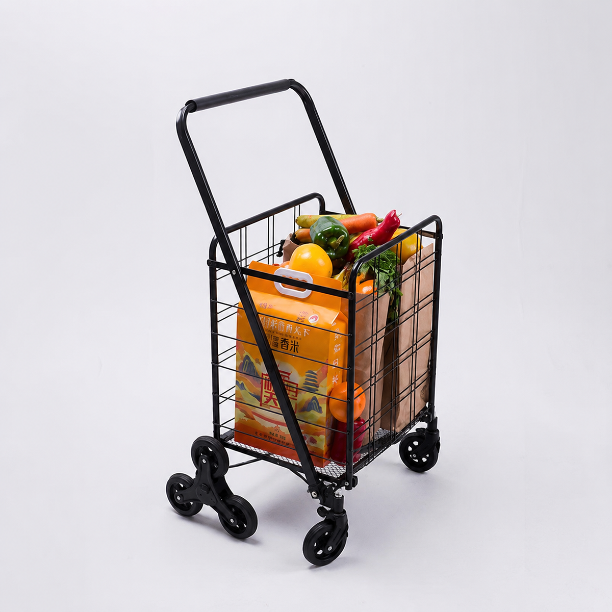 Black shopping cart filled with groceries on a white background