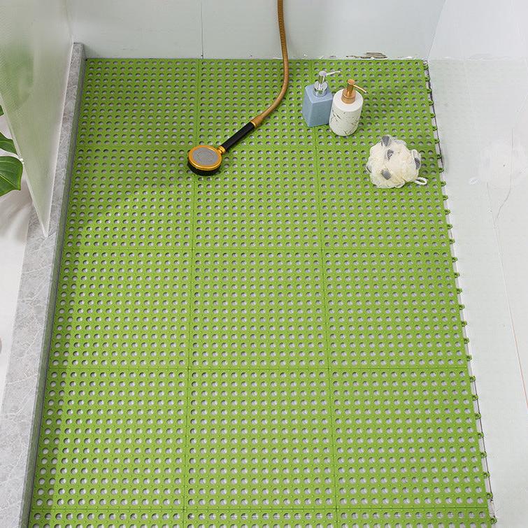 A Non-Slip Bathroom Shower Mat is Placed at the Floor Of Shower Room.