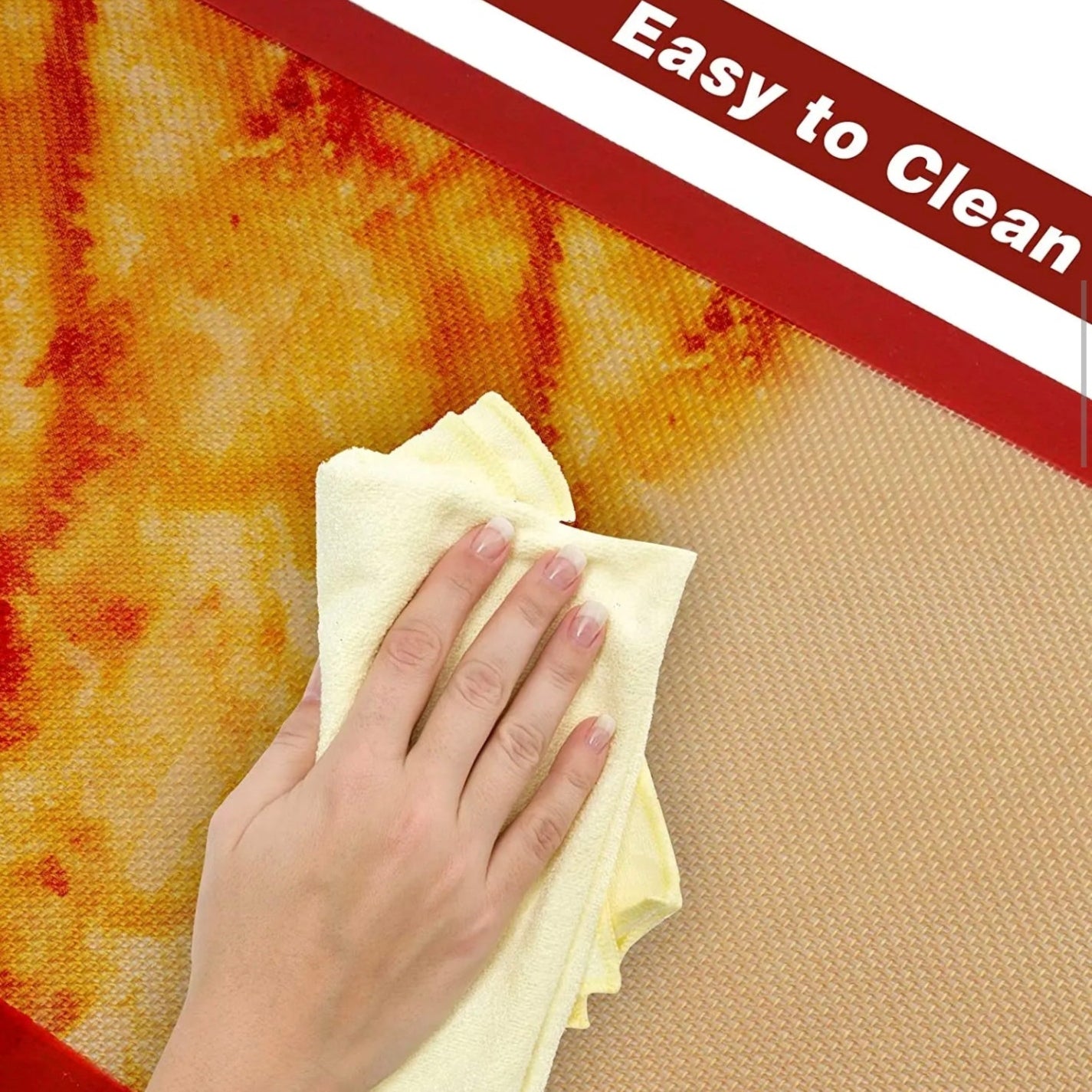 A Person is Cleaning Silicone Macron Baking Dough Mat.