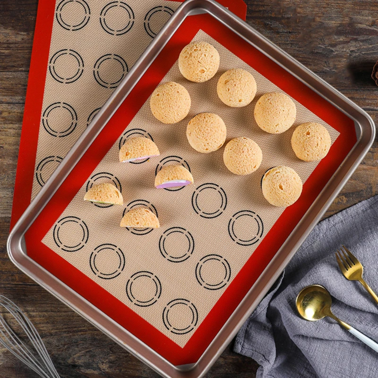 Silicone Macron Baking Dough Mat with Baked Cookies.