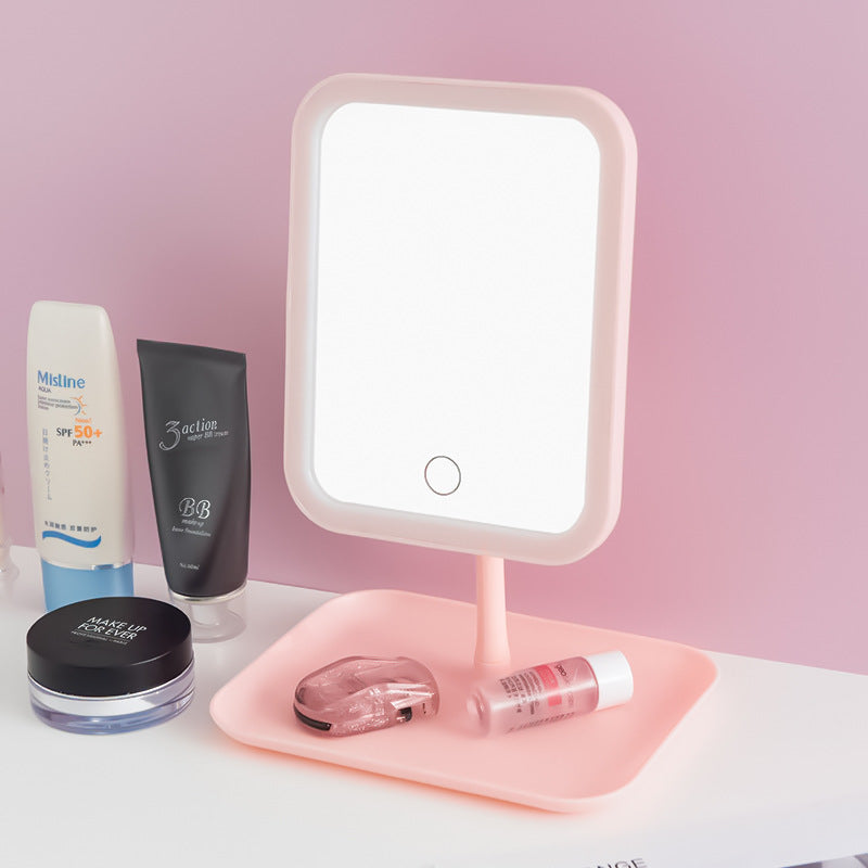 Smart LED Makeup Mirror is Placed Along with Cosmetics Items.
