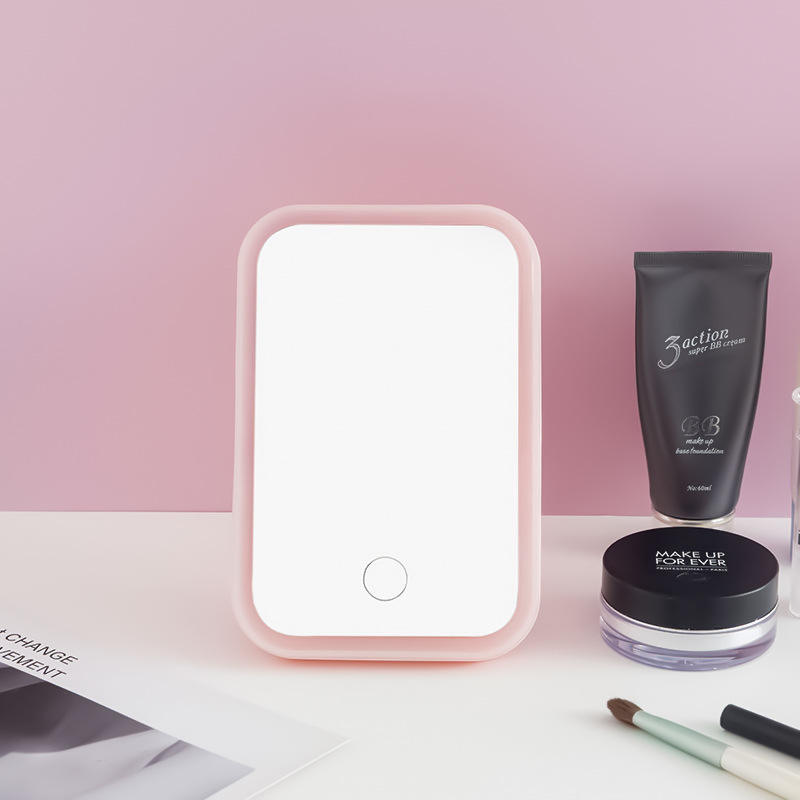 Smart LED Makeup Mirror is Placed Along with Cosmetics Items.