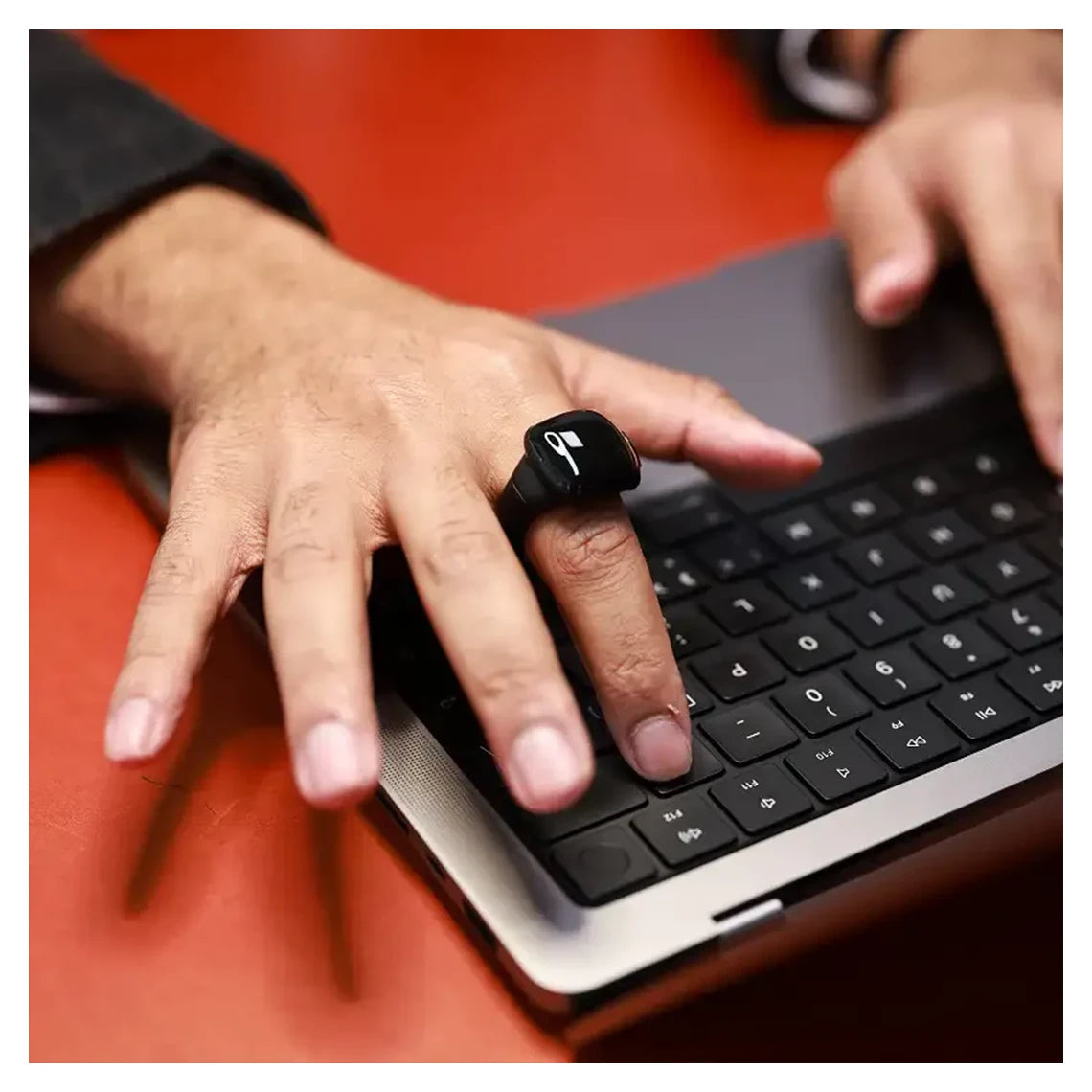 A Person is Wearing Smart Tasbih Zikr Ring Counter While Working.