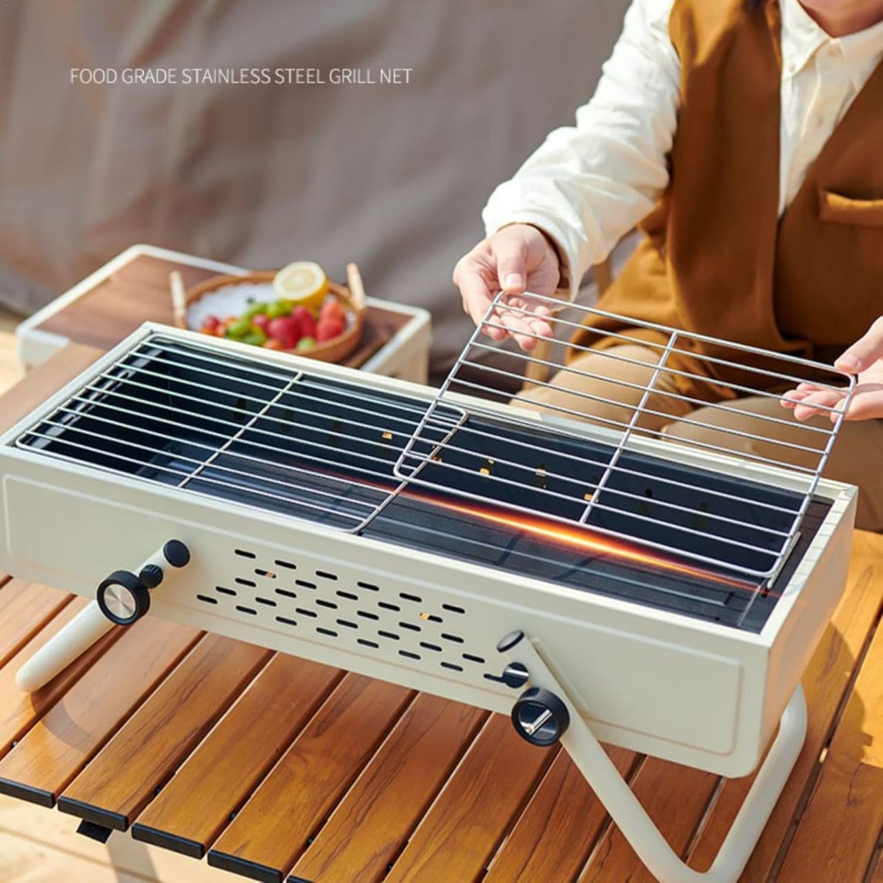 A Person is Arranging Smokeless BBQ Grill.