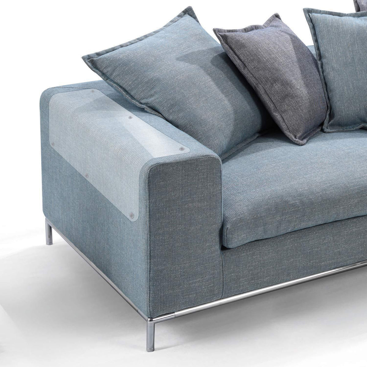 A Sofa Set  is Covered With Pet Scratch Guard Furniture Protector Sticker.