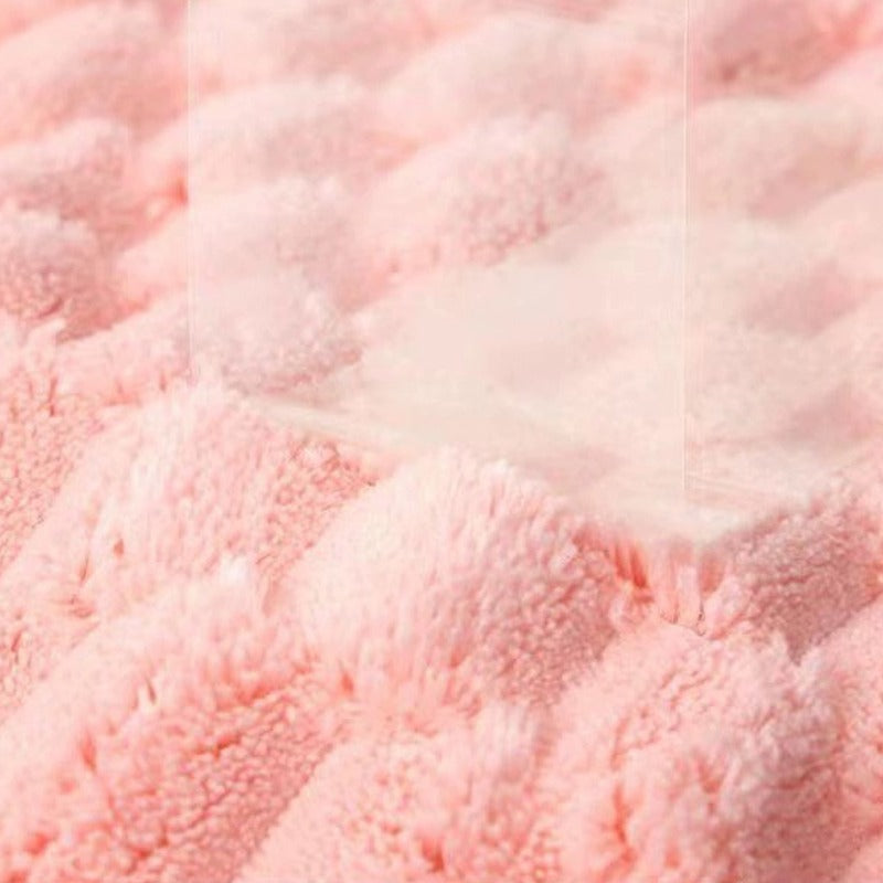 Fabric Of Soft Coral Fleece Bath Towels.