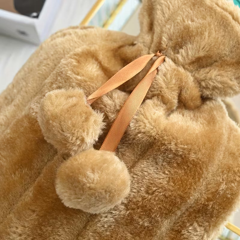 Close-up of a Soft Plush Hot Water Bag with a ribbon around its neck.